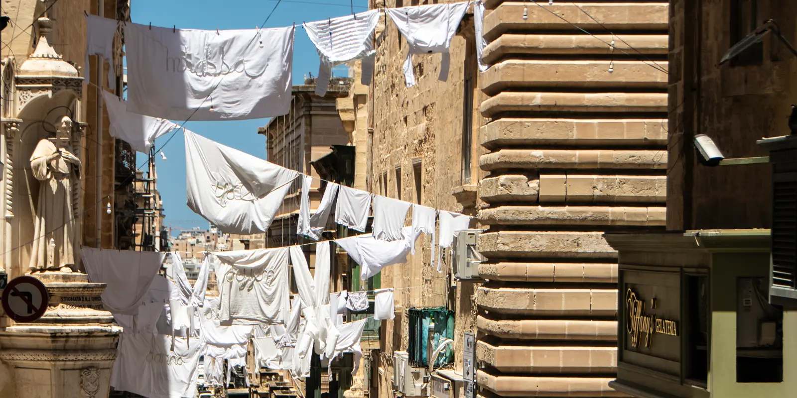 A street in Valletta with traditional enclosed balconies