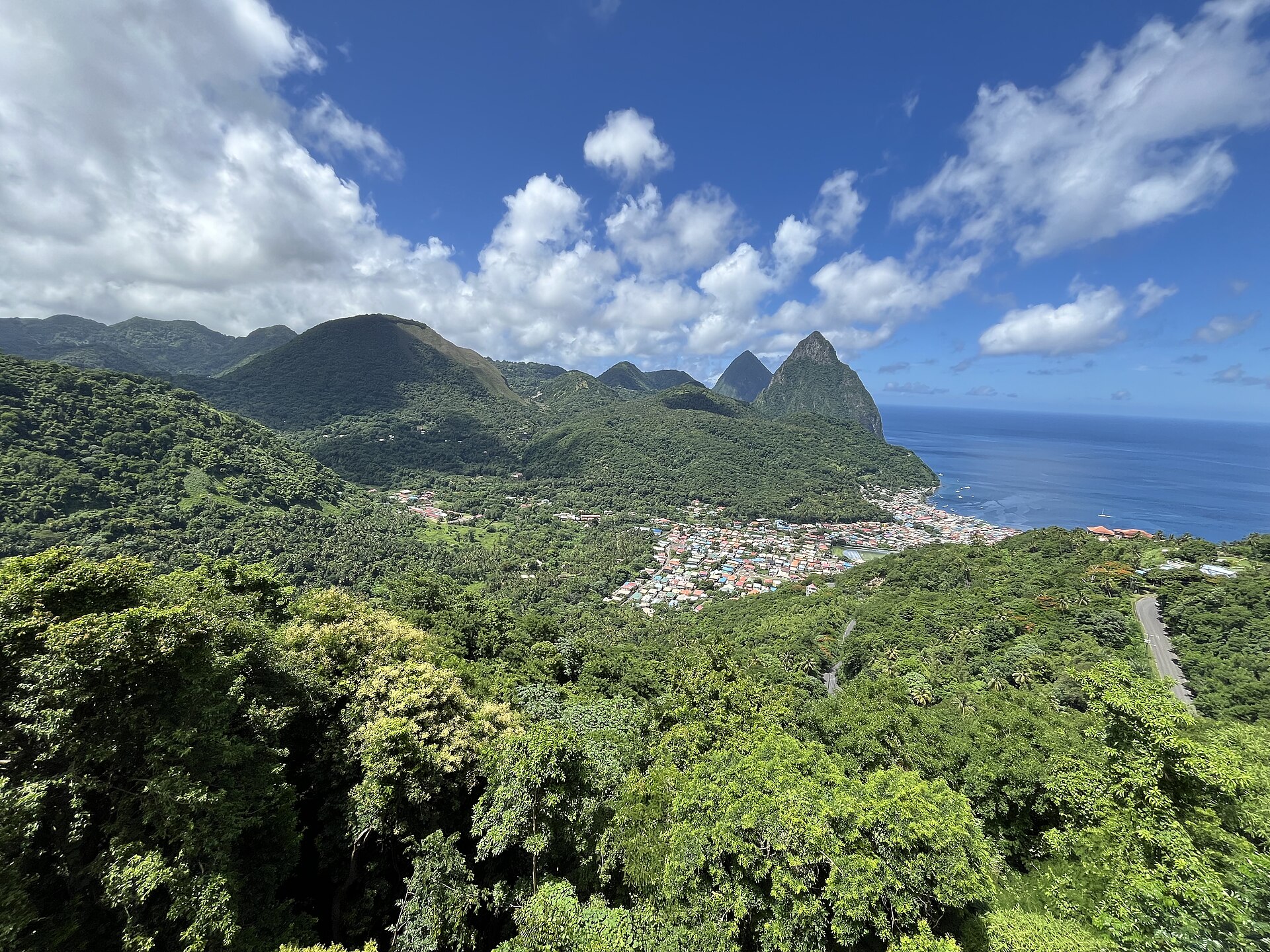 Soufrière photograph: DavidMPyle, CC BY 4.0, via Wikimedia Commons Soufrière and the Pitons in Saint Lucia