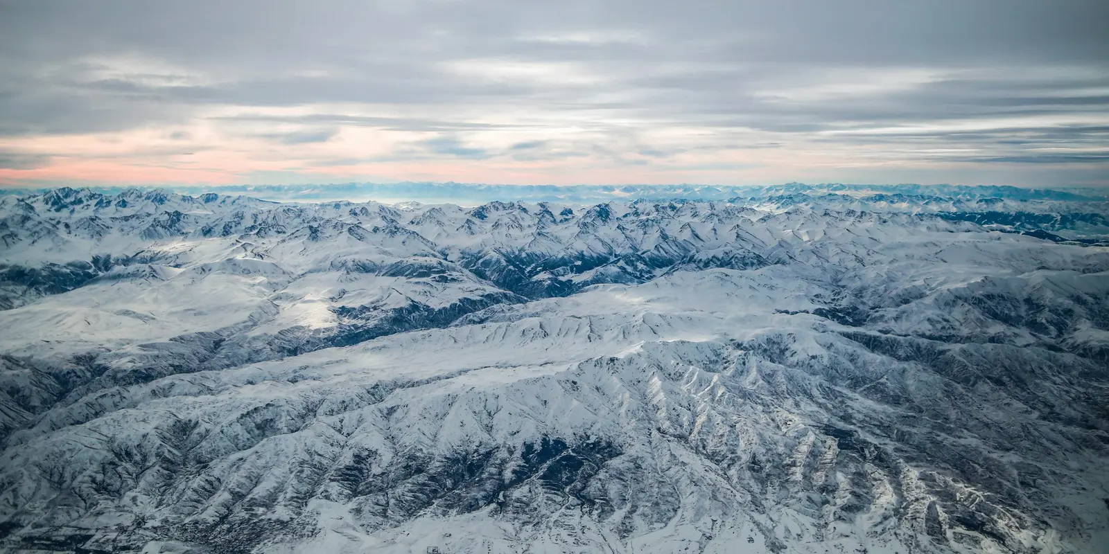 Aerial view of snow-capped Pamir mountains above Tajikistan