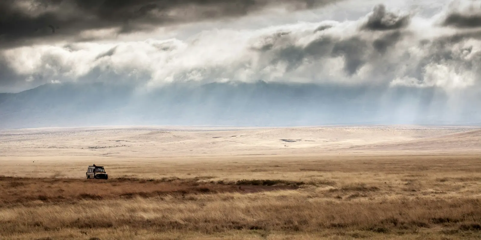 Ngorongoro Crater — signal is strongest around the rim, where most lodges sit Safari vehicle at golden hour in the Ngorongoro Crater area, Tanzania