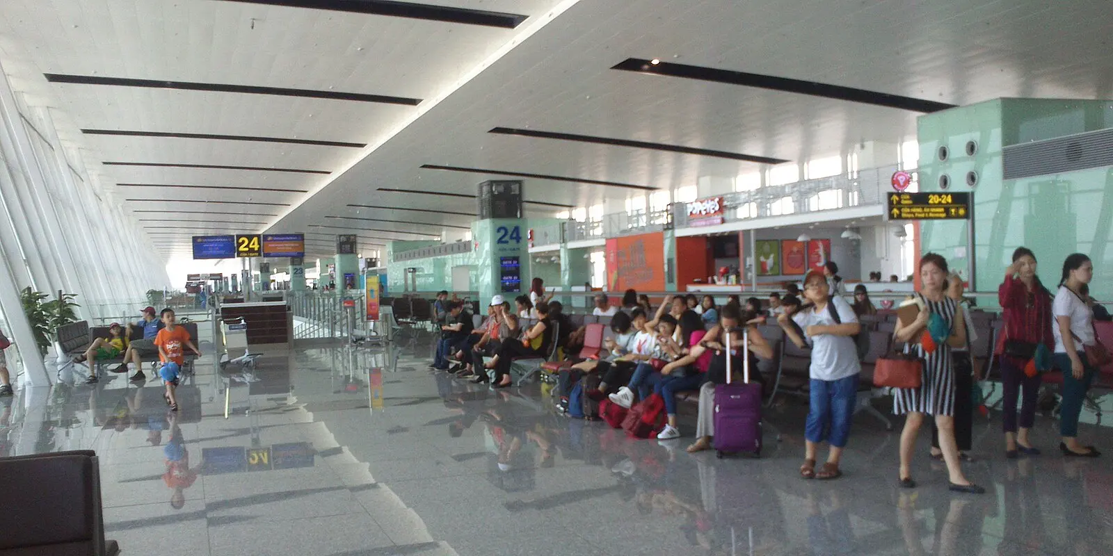 Noi Bai International Airport T2 waiting area Passengers in the T2 waiting area at Noi Bai International Airport