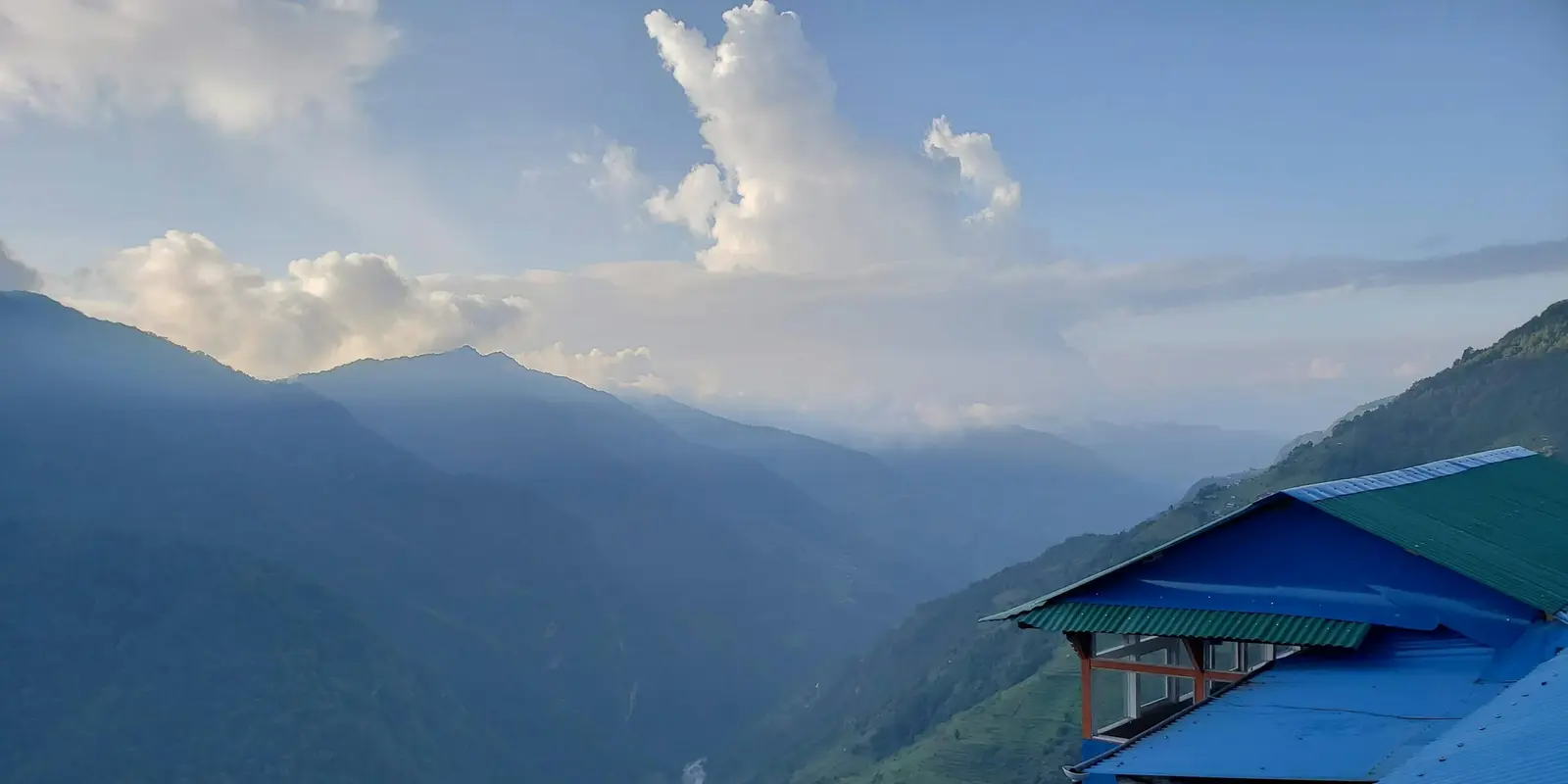 Teahouse WiFi along the Annapurna Circuit is solar-powered and shared, reliable in the lower villages and progressively less so with altitude View from a teahouse high in the Himalayas, overlooking misty mountains and a winding river along a Nepal trekking route
