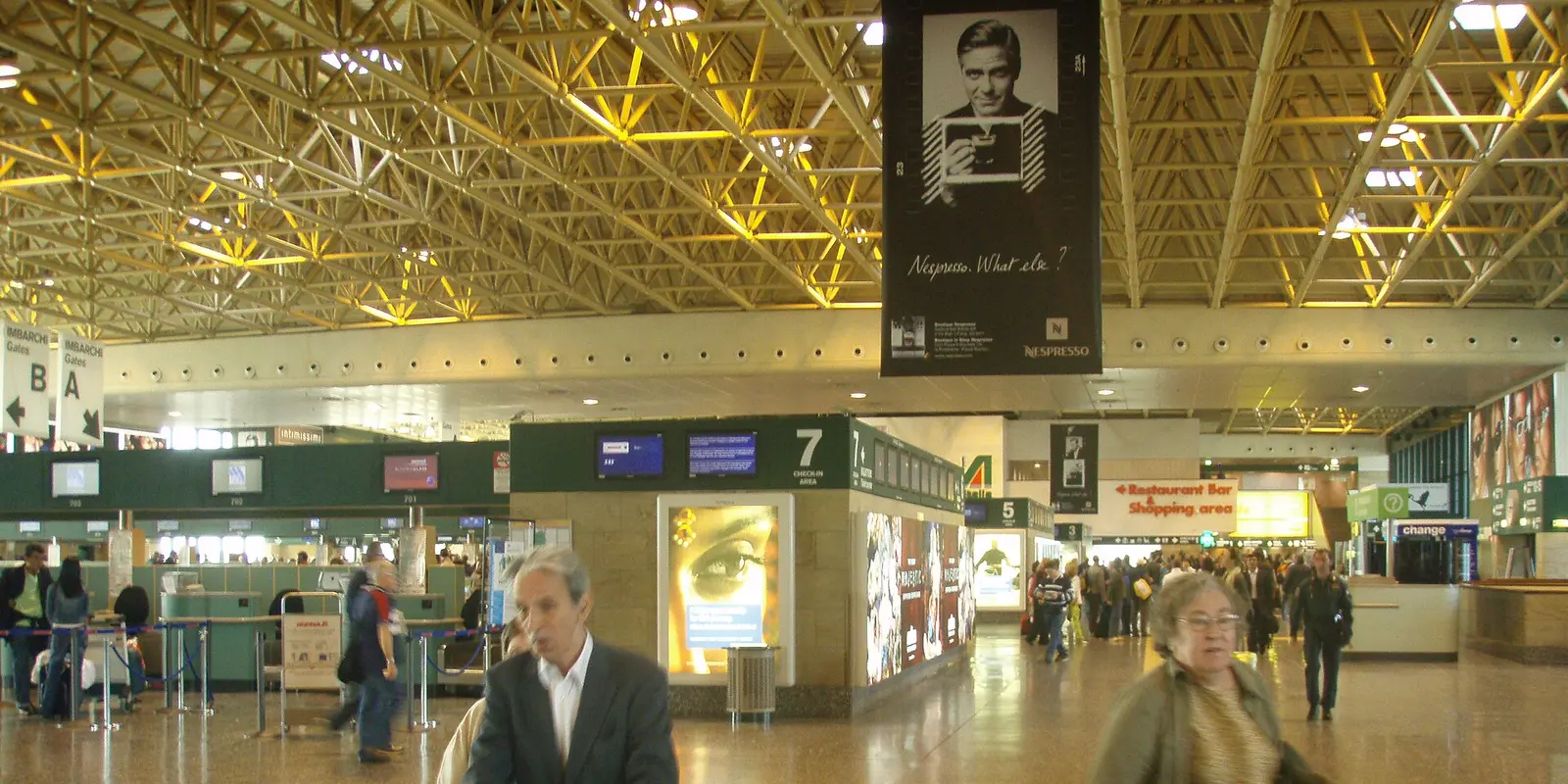 Terminal Wi-Fi ends where the airport does Passengers in a Milan Malpensa terminal where the free airport Wi-Fi network is available